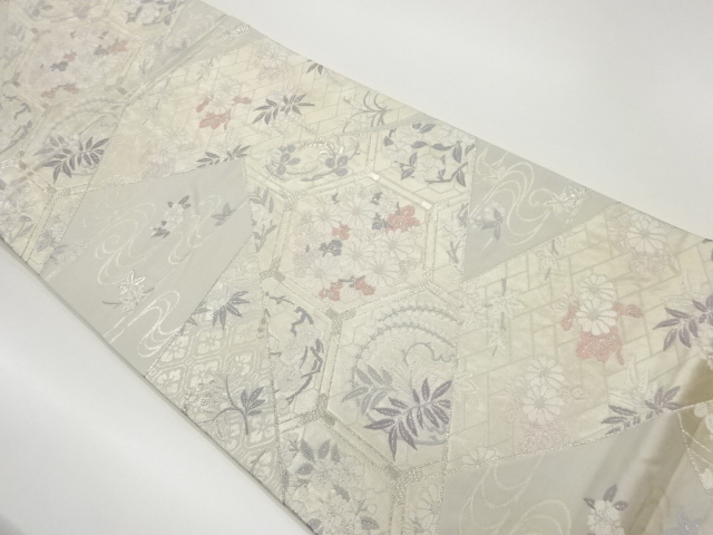 切り嵌め風亀甲に花々模様織出し袋帯